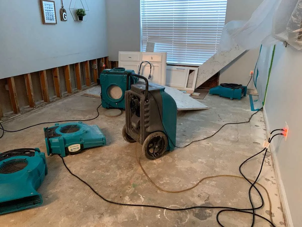 Dehumidifier in flood-cut room for Water Damage Restoration in Oildale