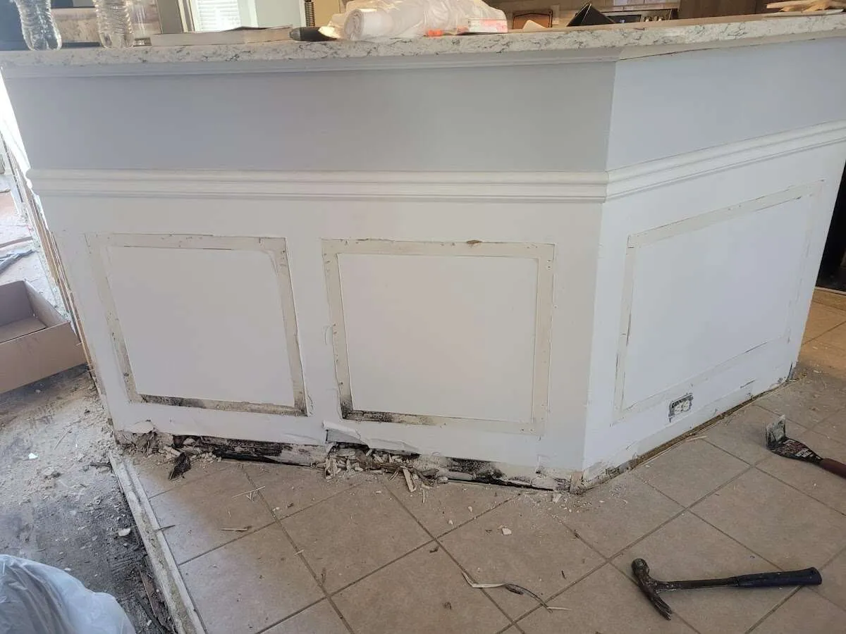 Water damage and mold on kitchen during Storm Damage Restoration in Oildale